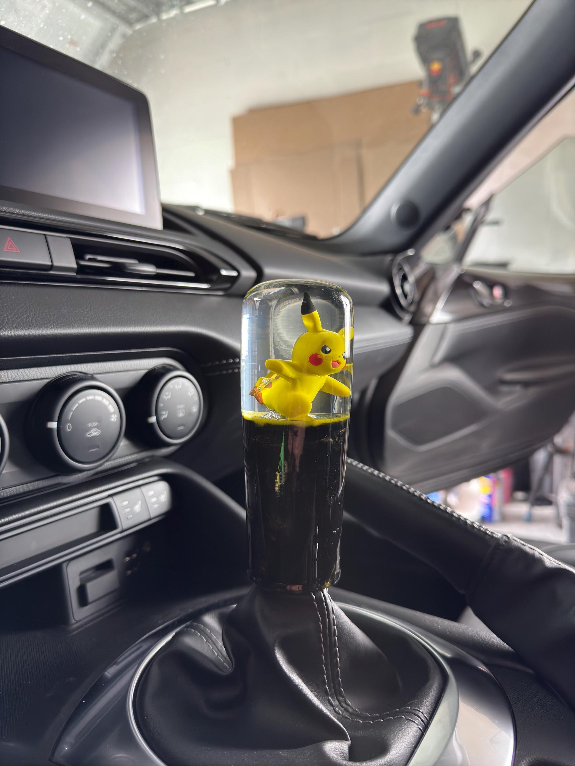 Custom Pikachu Shift Knob with Black & Yellow Base – Unique Pokémon Gear Knob for the Geek Car Enthusiast!
