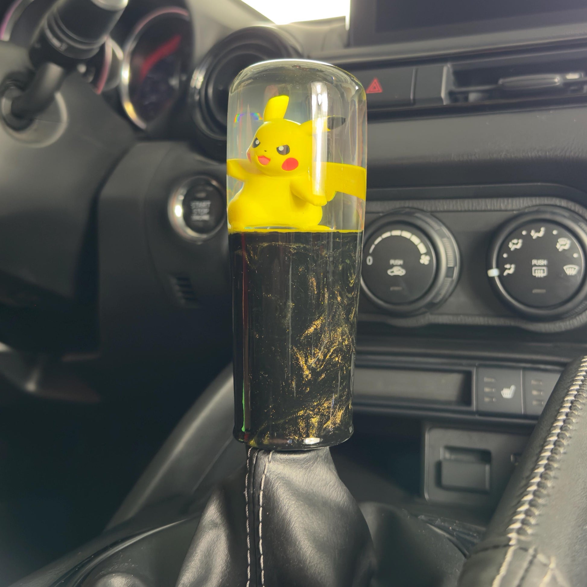 Custom Pikachu Shift Knob with Black & Yellow Base – Unique Pokémon Gear Knob for the Geek Car Enthusiast!