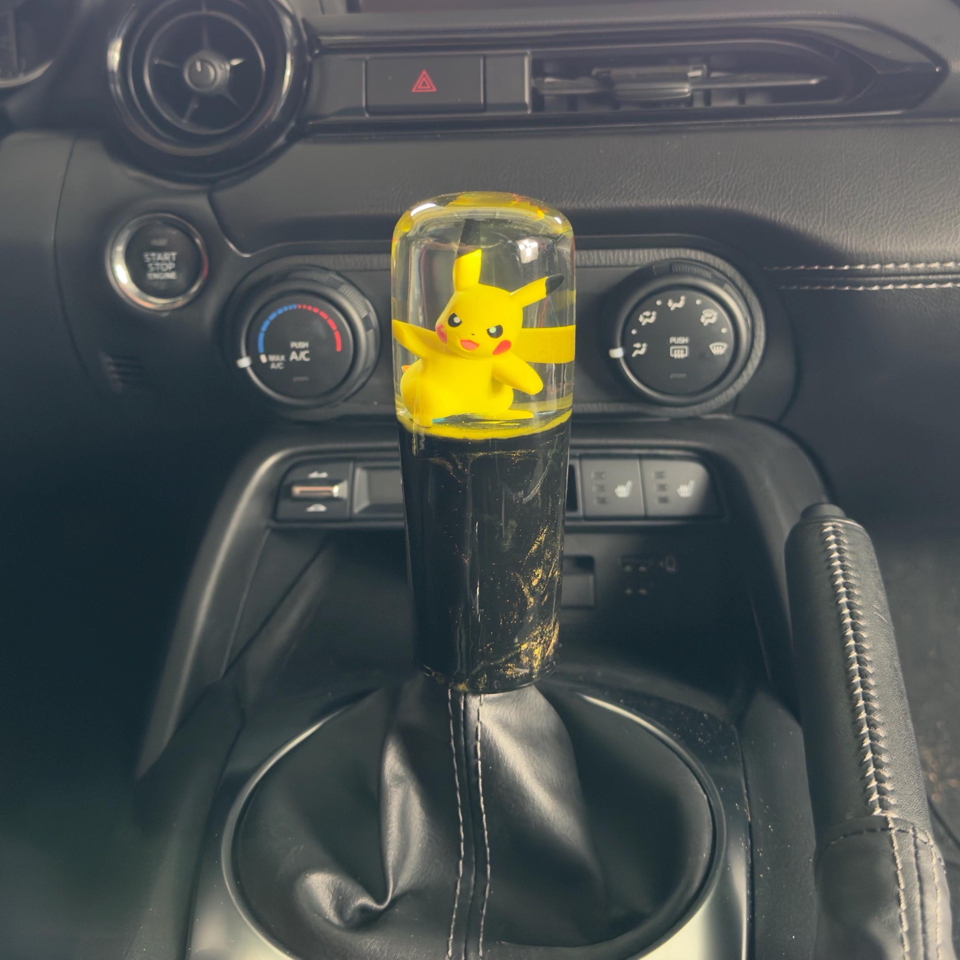 Custom Pikachu Shift Knob with Black & Yellow Base – Unique Pokémon Gear Knob for the Geek Car Enthusiast!
