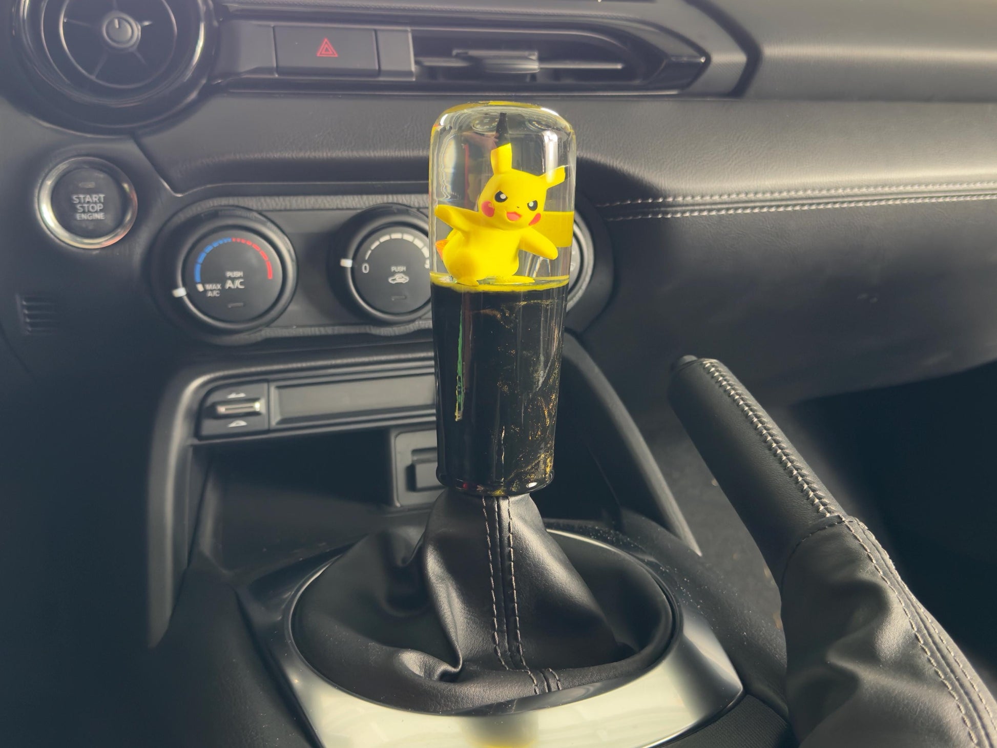 Custom Pikachu Shift Knob with Black & Yellow Base – Unique Pokémon Gear Knob for the Geek Car Enthusiast!